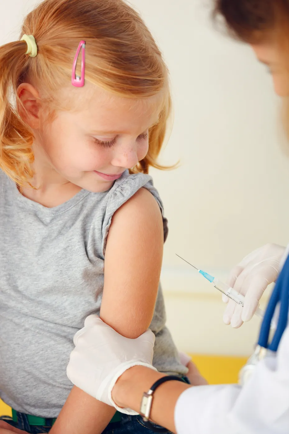 Child receiving a vaccine